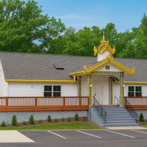 Exterior view of the School/College 60×80 commercial building with front deck, central staircase, and decorative gable trim