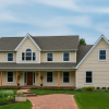 Fairfield II colonial kit home exterior – two-story 28x58 design with 4 bedrooms, 2.5 baths, and two-car garage.